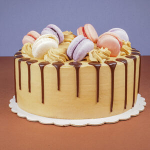 Golden Delight: Yellow Birthday Cake with Chocolate Ganache