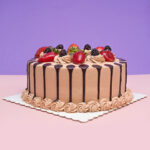 Coffee Bliss: Mocha Cream Birthday Cake with Decadent Chocolate Sauce