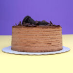 Mocha Cocoa Bliss: Coffee Cream Birthday Cake with Chocolate Shavings and Oreo Cookies