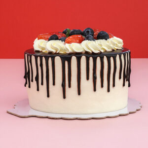 Vanilla Elegance: White Chocolate and Strawberry Birthday Cake